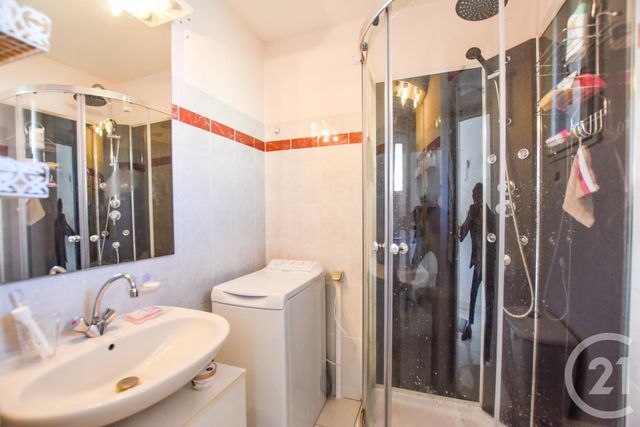Afficher la photo en grand appartement à vendre - 3 pièces - 37.0 m2 - CAVALAIRE SUR MER - 83 - PROVENCE-ALPES-COTE-D-AZUR - Century 21 Bianchi Transactions